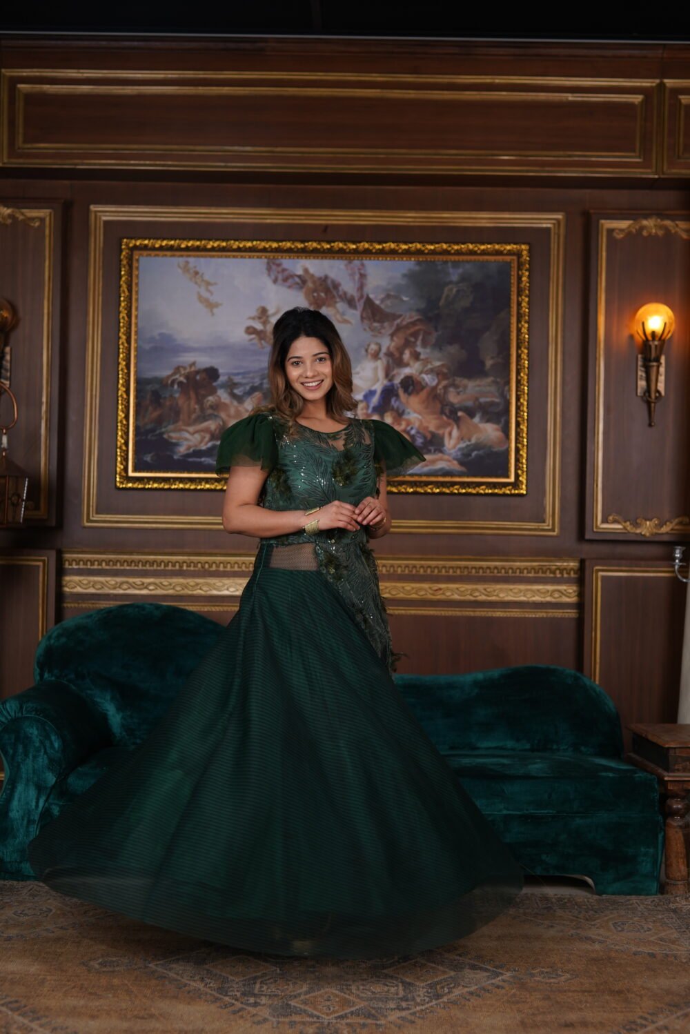 Dark Green Gown With Front And Back Feather And Sequin Work